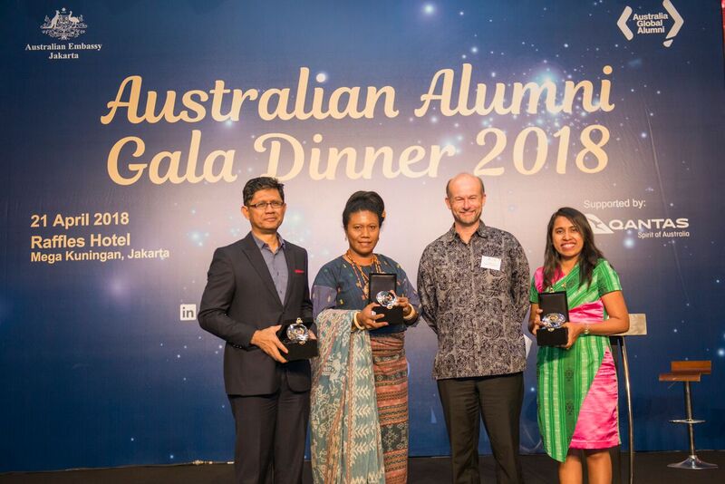 Four people wearing formal outfit at Gala Dinner