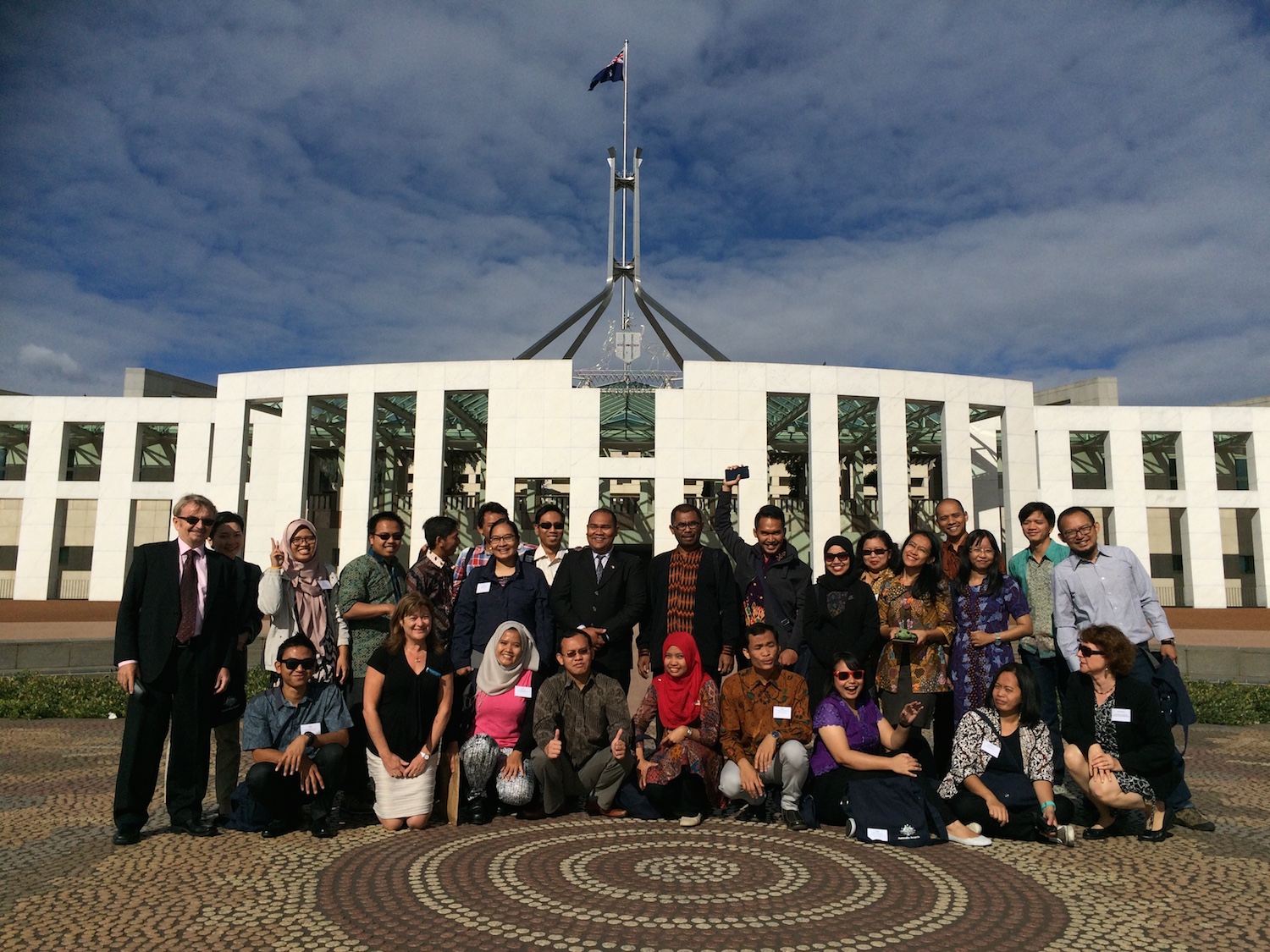 A group of people smiling